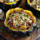A close up of a delicious looking meal in a pumpkin.